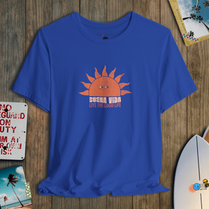 Blue t-shirt with a sun graphic and text on a wooden surface