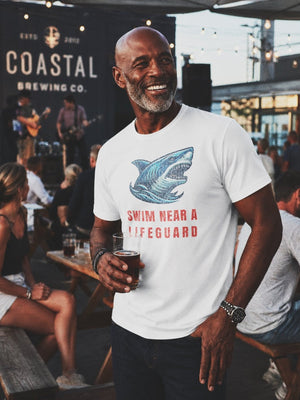 Swim Near Lifeguard Shark Tee | Coastal Graphic Tee | Ultra - Soft Eco - Friendly Graphic Tee